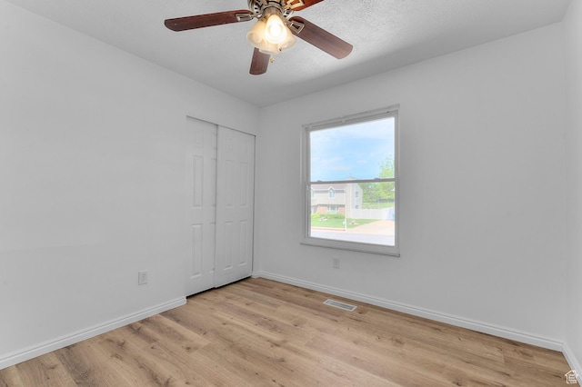 1188 E 300 N, Layton, UT 84040 - empty room featuring baseboards, light wood finished floors, and a ceiling fan