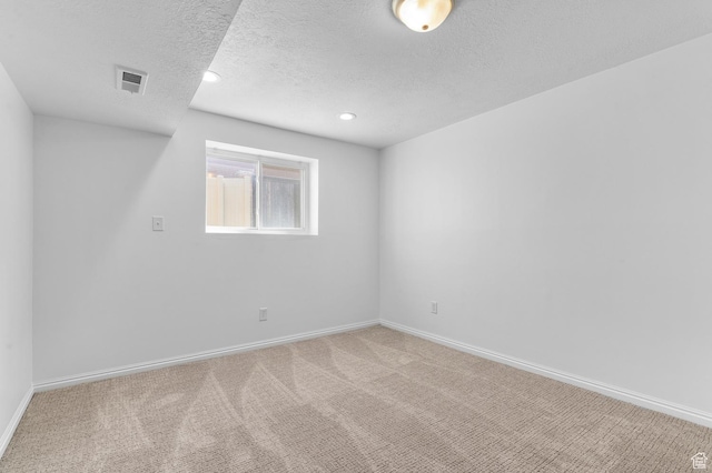 1188 E 300 N, Layton, UT 84040 - empty room with carpet flooring, baseboards, a textured ceiling, and recessed lighting