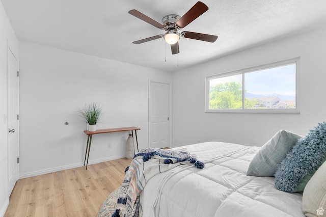 1188 E 300 N, Layton, UT 84040 - bedroom featuring light wood-style flooring, baseboards, and ceiling fan