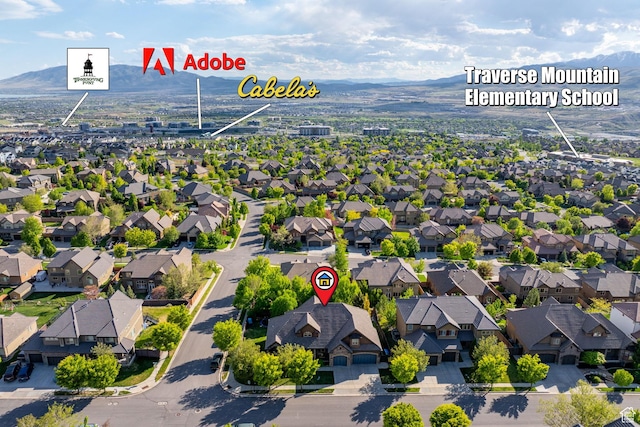 aerial view of residential area with mountains
