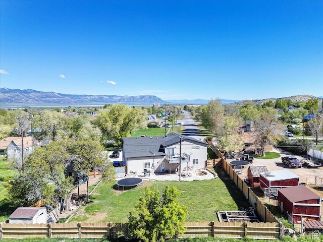 view of subject property featuring a mountain backdrop
