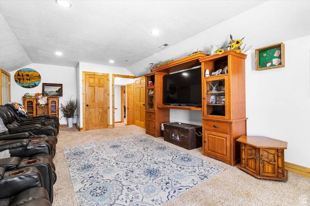 living area with lofted ceiling, light carpet, recessed lighting, baseboards, and a textured ceiling