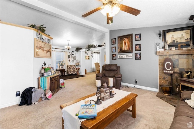 living area with carpet floors, a ceiling fan, a chandelier, and baseboards