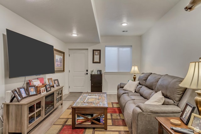 living area with light wood-style floors