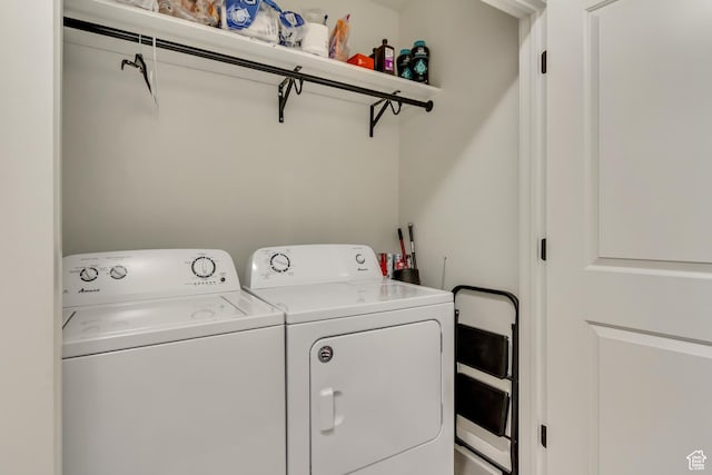 washroom featuring independent washer and dryer