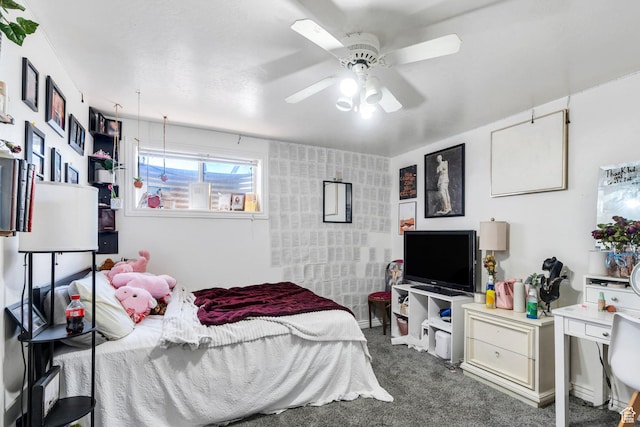 carpeted bedroom featuring a ceiling fan