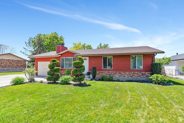 ranch-style home with a garage, a chimney, concrete driveway, and brick siding