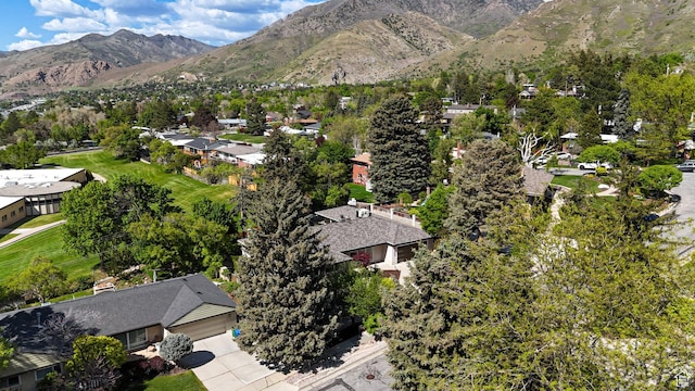 aerial view of residential area with a mountainous background