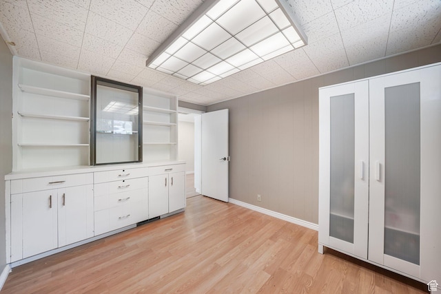 3501 E Loren Von Dr, Millcreek, UT 84124 - unfurnished living room featuring light wood-type flooring and baseboards