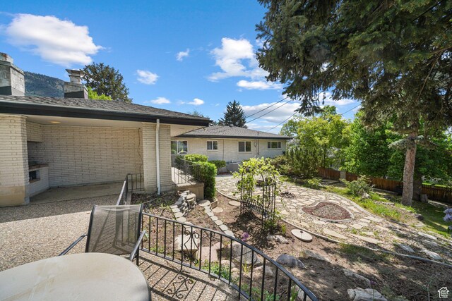 3501 E Loren Von Dr, Millcreek, UT 84124 - view of yard with a patio area and stairs