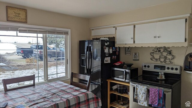 1341 E Creek Rd, Cottonwood Heights, UT 84093 - kitchen with stainless steel appliances and white cabinets
