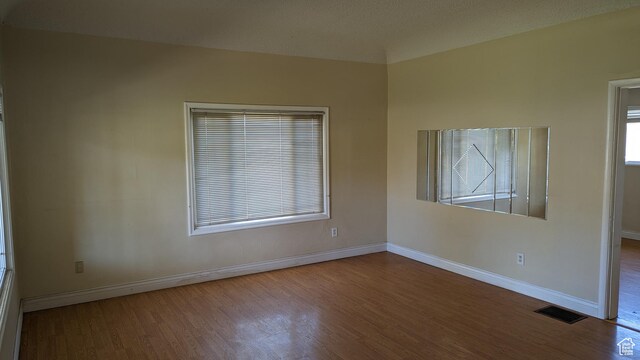 1341 E Creek Rd, Cottonwood Heights, UT 84093 - spare room featuring wood finished floors and baseboards
