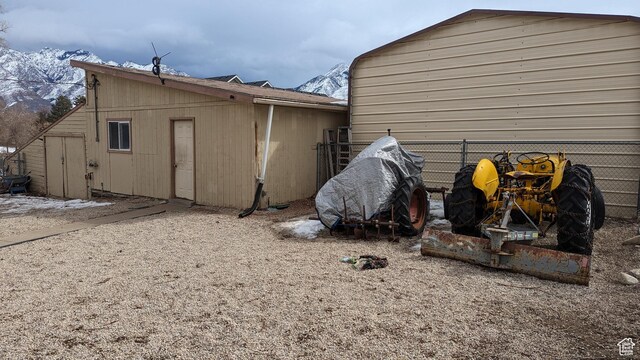 1341 E Creek Rd, Cottonwood Heights, UT 84093 - view of outdoor structure with fence and a mountain view