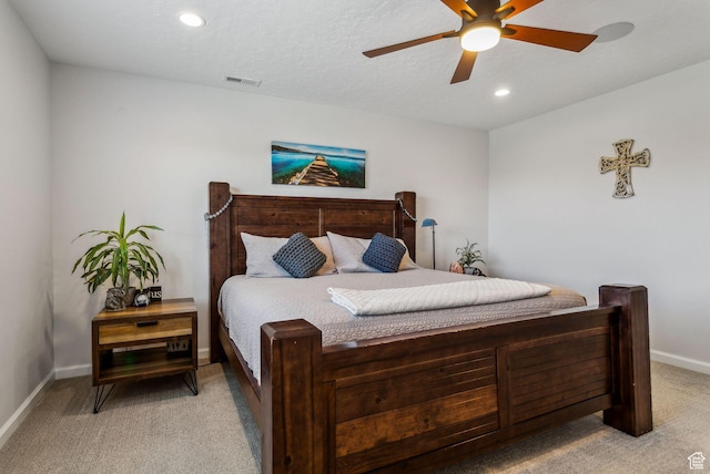 bedroom with light carpet, baseboards, ceiling fan, and recessed lighting