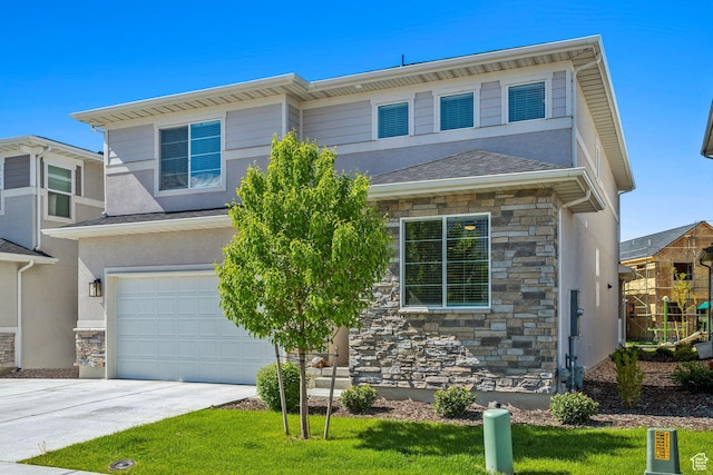 view of front of home with stone siding, an attached garage, stucco siding, driveway, and a front lawn