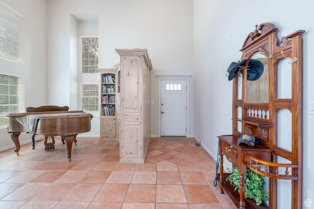 1200 N Warm Springs Rd, Midway, UT 84049 - foyer with a high ceiling, baseboards, and light tile patterned floors