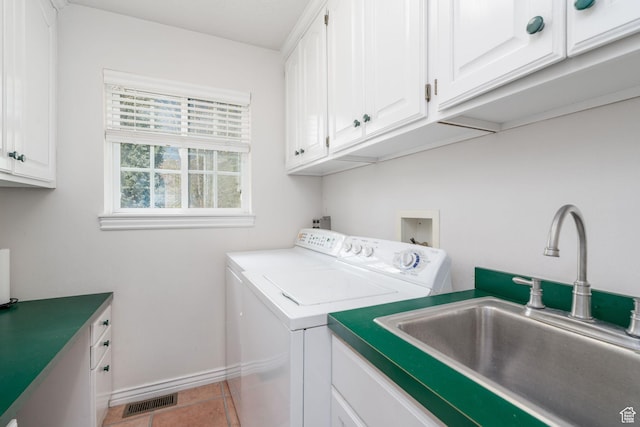 1200 N Warm Springs Rd, Midway, UT 84049 - clothes washing area featuring washing machine and dryer, cabinet space, and baseboards
