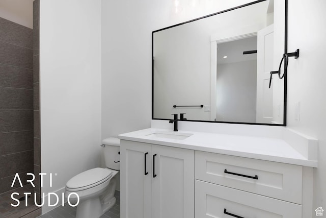 bathroom with vanity and toilet