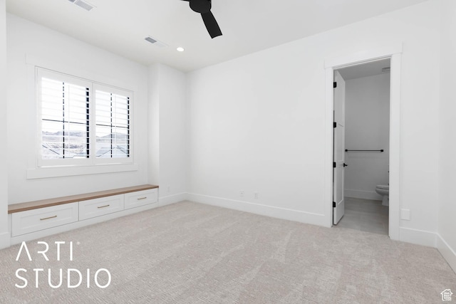 unfurnished bedroom with light colored carpet, baseboards, ensuite bathroom, ceiling fan, and recessed lighting