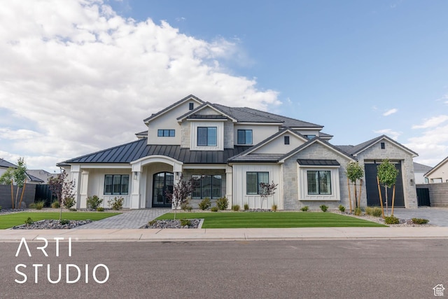 view of front of home featuring a standing seam roof, metal roof, and board and batten siding