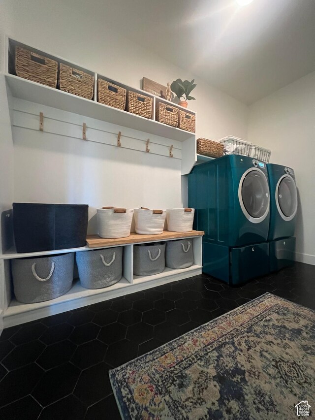 4901 N Eagle Nest Ln, Lehi, UT 84043 - mudroom with washing machine and clothes dryer and tile patterned floors