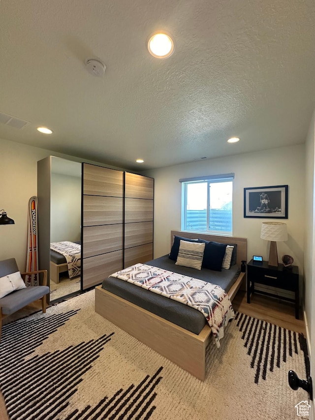 4901 N Eagle Nest Ln, Lehi, UT 84043 - bedroom with recessed lighting and a textured ceiling