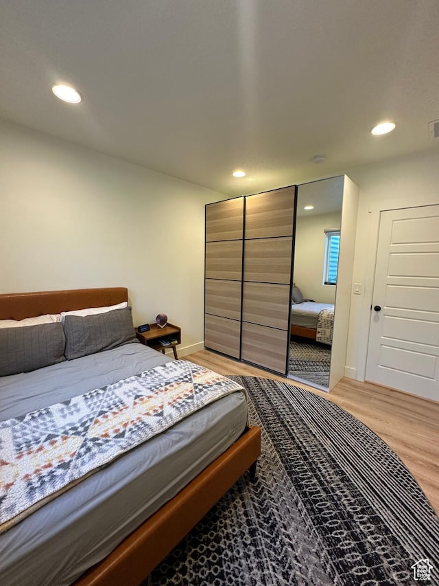 4901 N Eagle Nest Ln, Lehi, UT 84043 - bedroom with light wood-style floors, recessed lighting, and baseboards