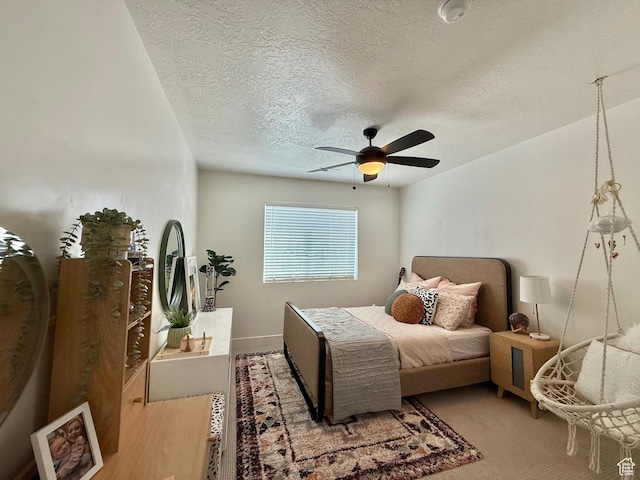 4901 N Eagle Nest Ln, Lehi, UT 84043 - bedroom featuring a textured ceiling, ceiling fan, and light carpet