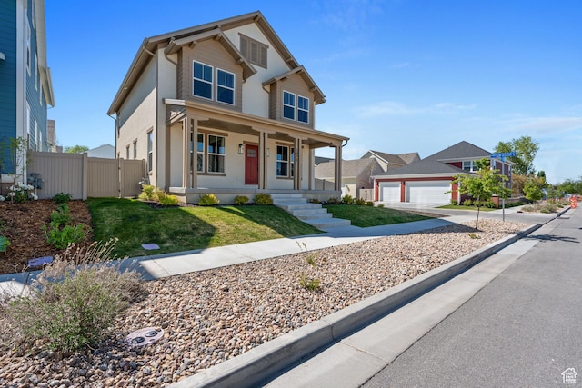 1071 W Shoreline Dr, Layton, UT 84041 - view of front facade featuring covered porch, a detached garage, a gate, and stucco siding