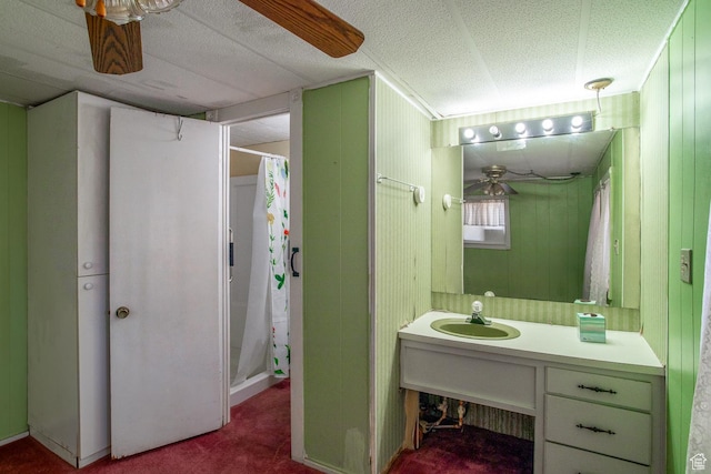 345 N Main St, Ivins, UT 84738 - full bath with a shower with curtain, vanity, and a ceiling fan