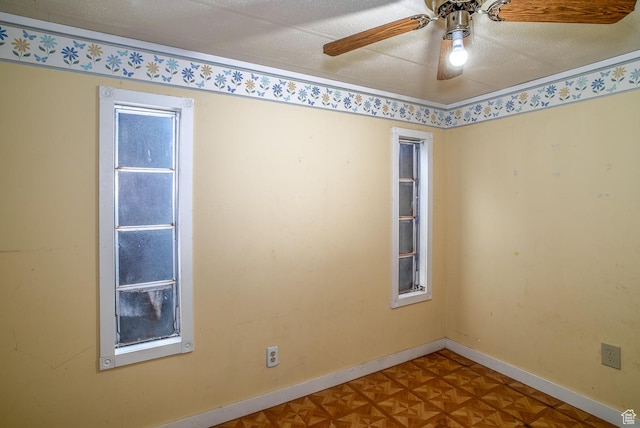 345 N Main St, Ivins, UT 84738 - spare room featuring a ceiling fan, baseboards, and a textured ceiling