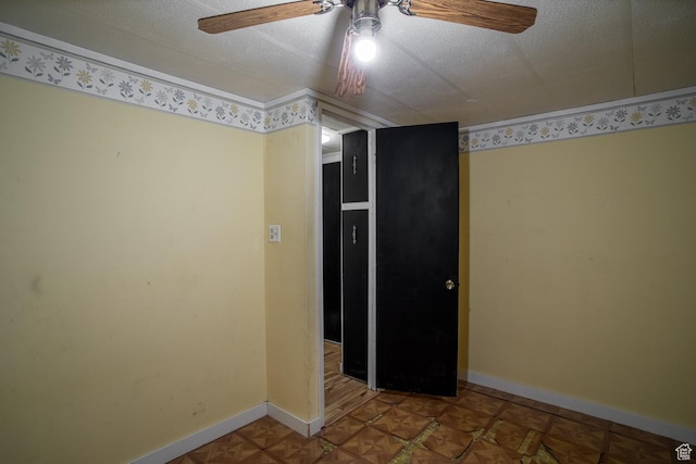 345 N Main St, Ivins, UT 84738 - empty room with ceiling fan, baseboards, and a textured ceiling
