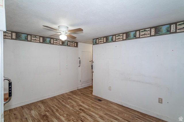 345 N Main St, Ivins, UT 84738 - spare room with a ceiling fan, wood finished floors, and baseboards