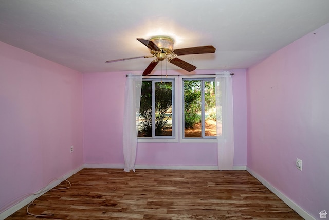 345 N Main St, Ivins, UT 84738 - empty room featuring wood finished floors, ceiling fan, and baseboards