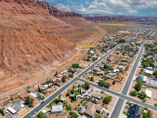345 N Main St, Ivins, UT 84738 - aerial overview of property's location featuring a mountainous background