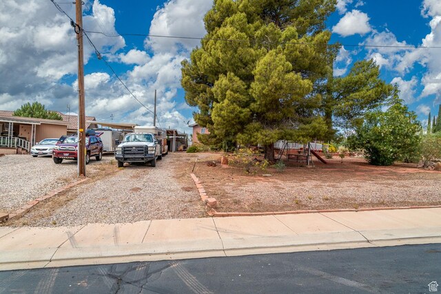 345 N Main St, Ivins, UT 84738 - obstructed view of property with a playground