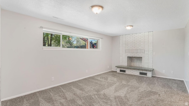 906 N Fort Canyon Rd, Alpine, UT 84004 - unfurnished living room featuring a brick fireplace, carpet floors, a textured ceiling, and baseboards