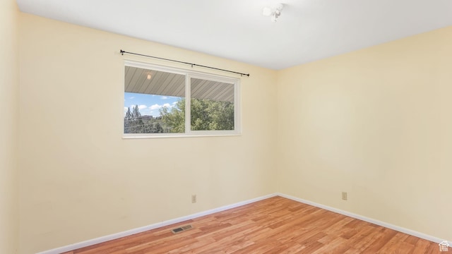 906 N Fort Canyon Rd, Alpine, UT 84004 - unfurnished room with baseboards and light wood-style flooring
