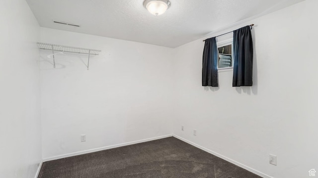906 N Fort Canyon Rd, Alpine, UT 84004 - spare room featuring baseboards and dark colored carpet
