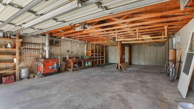906 N Fort Canyon Rd, Alpine, UT 84004 - garage with a workshop area and a heating unit