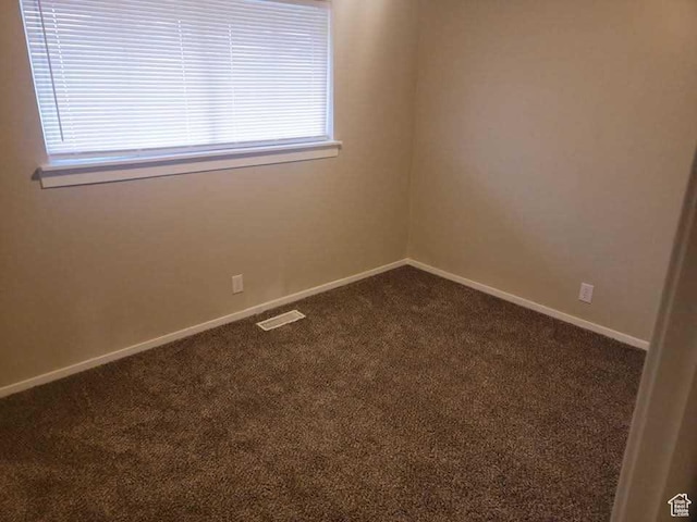 4520 S Ridgeline Dr, Washington Terrace, UT 84405 - spare room with dark carpet and baseboards