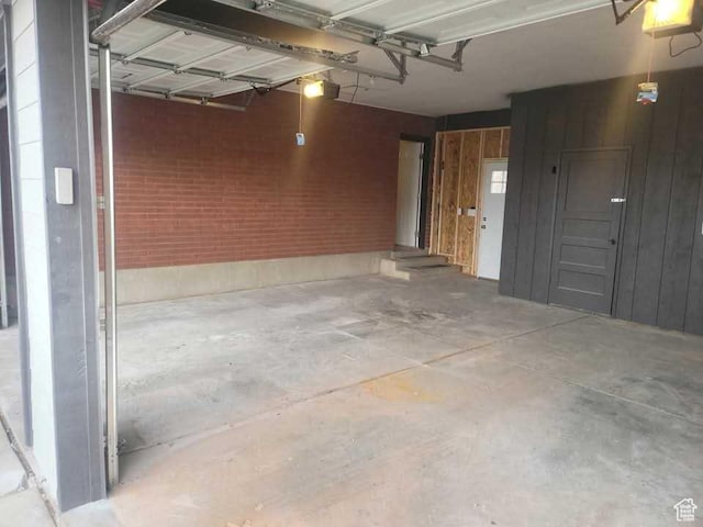 4520 S Ridgeline Dr, Washington Terrace, UT 84405 - garage with a garage door opener and wooden walls