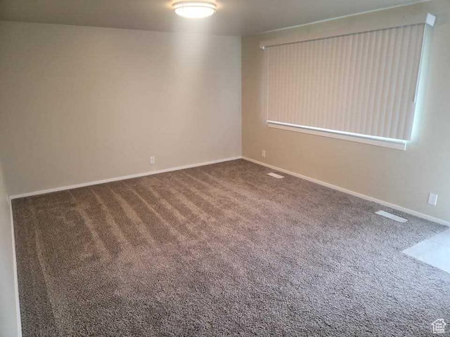 4520 S Ridgeline Dr, Washington Terrace, UT 84405 - spare room featuring carpet flooring and baseboards