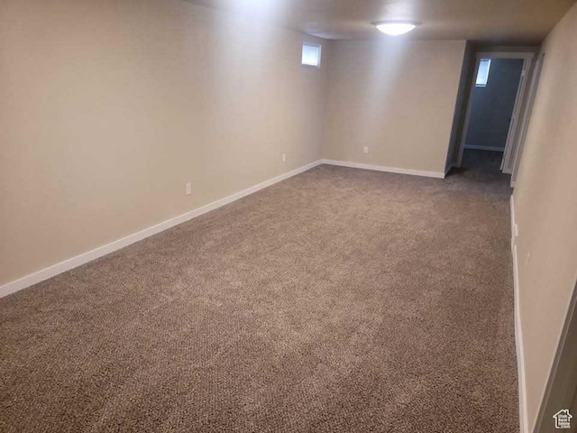 4520 S Ridgeline Dr, Washington Terrace, UT 84405 - basement with dark carpet and baseboards