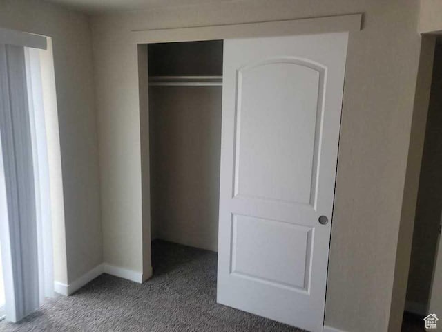 4520 S Ridgeline Dr, Washington Terrace, UT 84405 - unfurnished bedroom with carpet floors, a closet, and baseboards