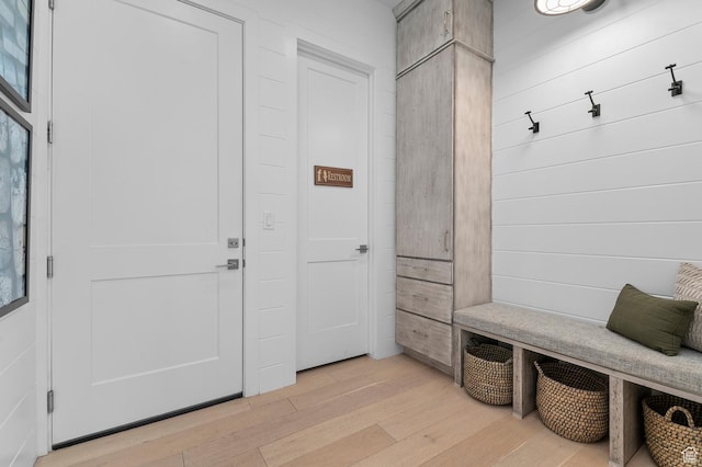 mudroom with light wood-style flooring
