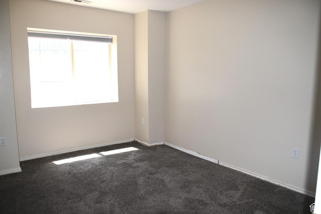 147 W 600 N Unit 111, Tooele, UT 84074 - unfurnished room with dark colored carpet and baseboards