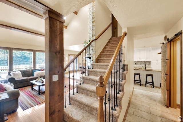 8135 S Clover Spring Ln E, Cottonwood Heights, UT 84121 - staircase featuring tile patterned floors