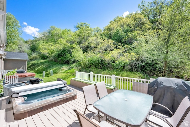 8135 S Clover Spring Ln E, Cottonwood Heights, UT 84121 - wooden deck with a covered hot tub, grilling area, outdoor dining area, and view of wooded area