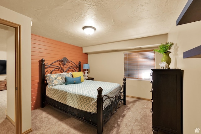 8135 S Clover Spring Ln E, Cottonwood Heights, UT 84121 - carpeted bedroom featuring wooden walls, a textured ceiling, and baseboards